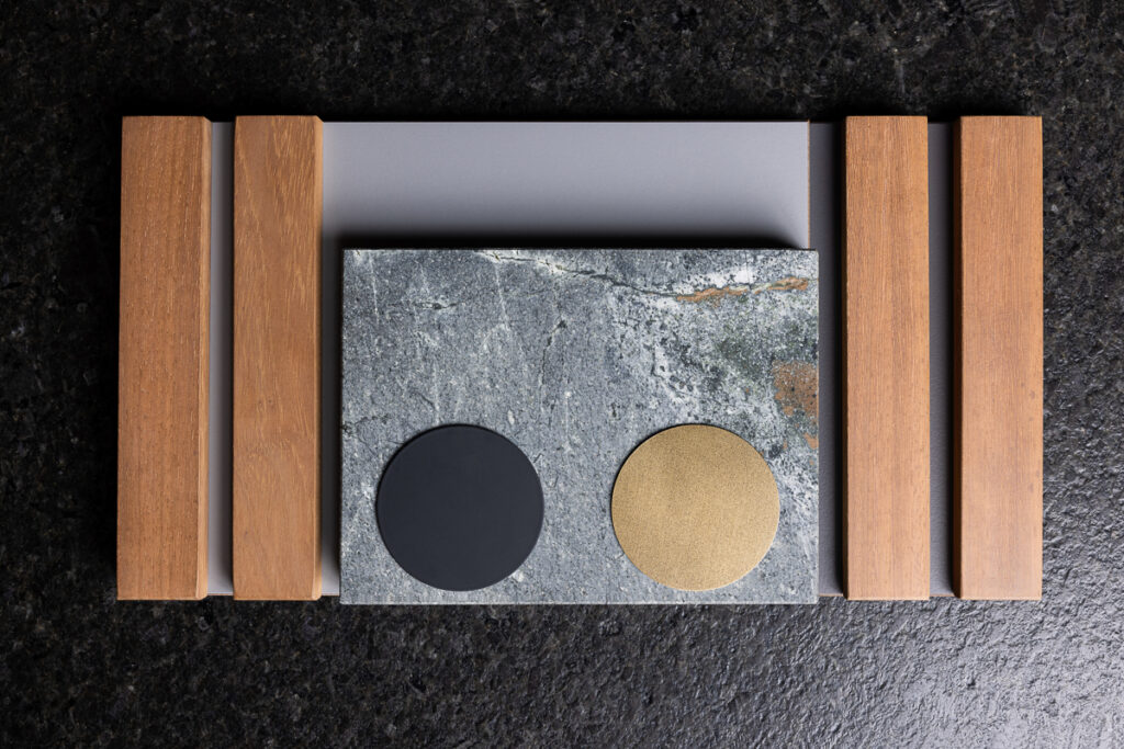 Moodboard der Outdoorküchen, Lamellen, graue Steinoberfläche mit goldenen und schwarzen Akzenten